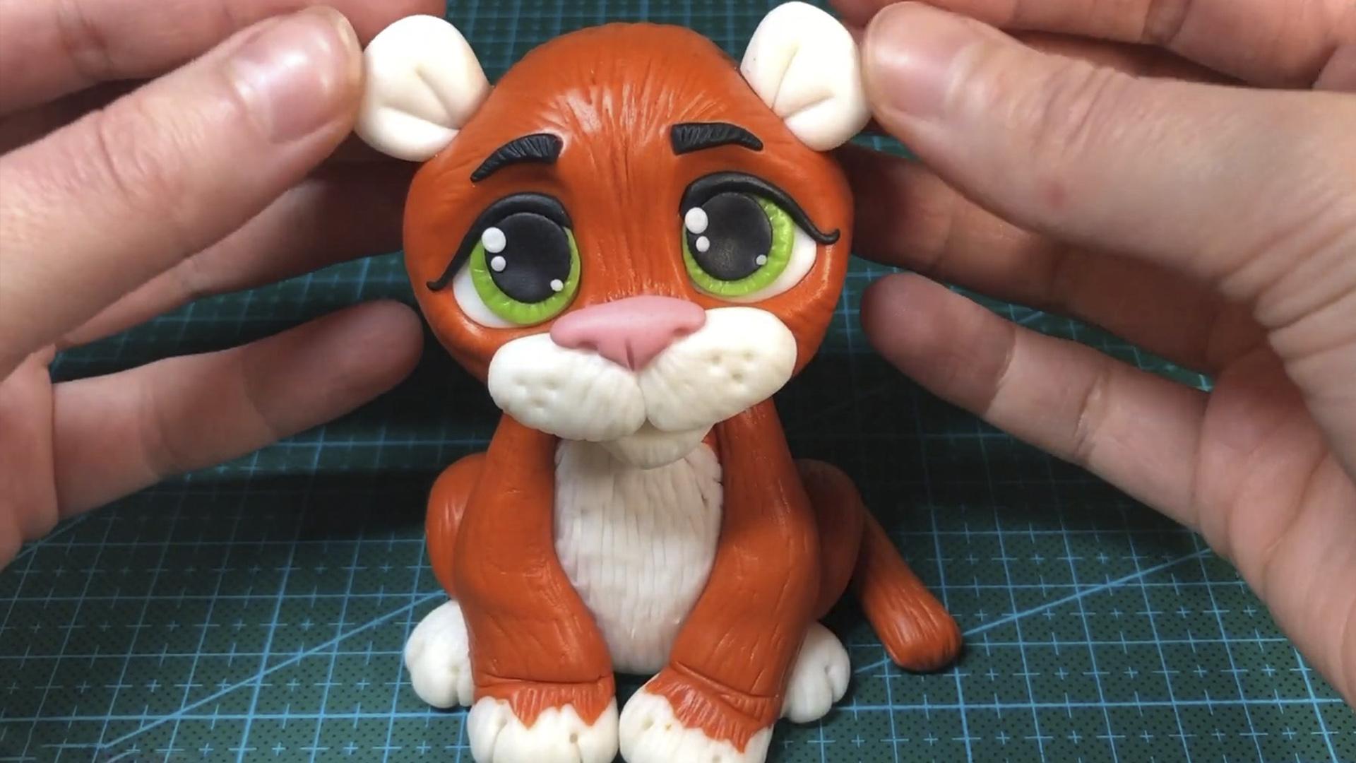 وصفة كعكة شبل النمر المصنوعة من عجينة السكر - الخطوة 10