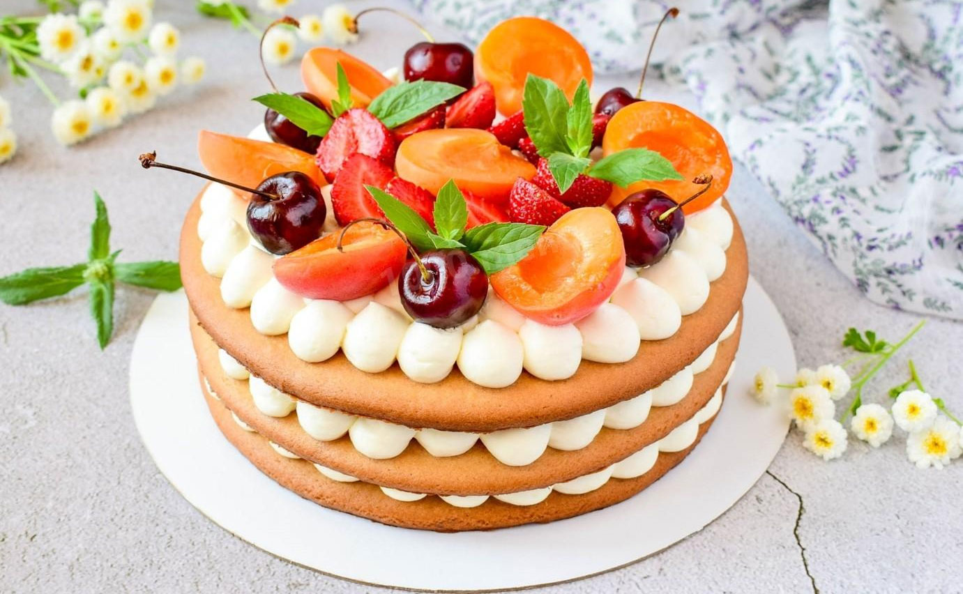 Pastís de mel amb cobertura de formatge crema