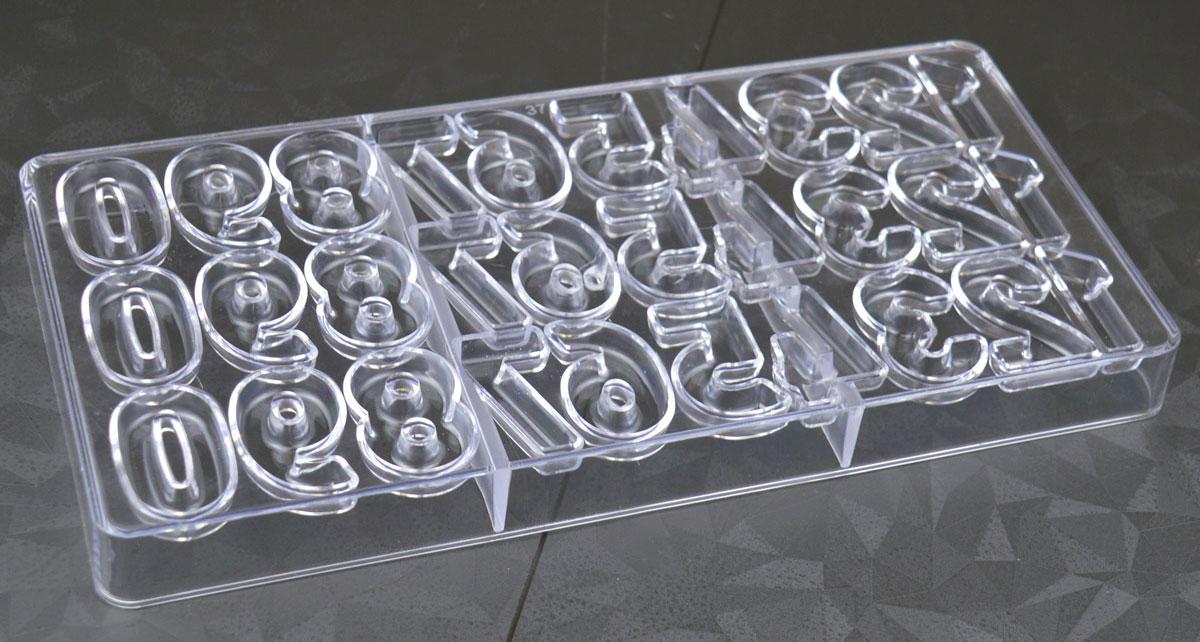 Motlles de policarbonat per a números de xocolata